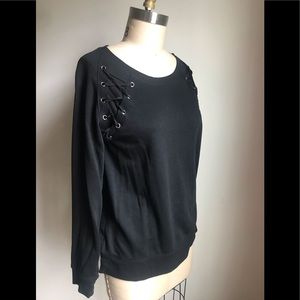 Sweater with lace up detail